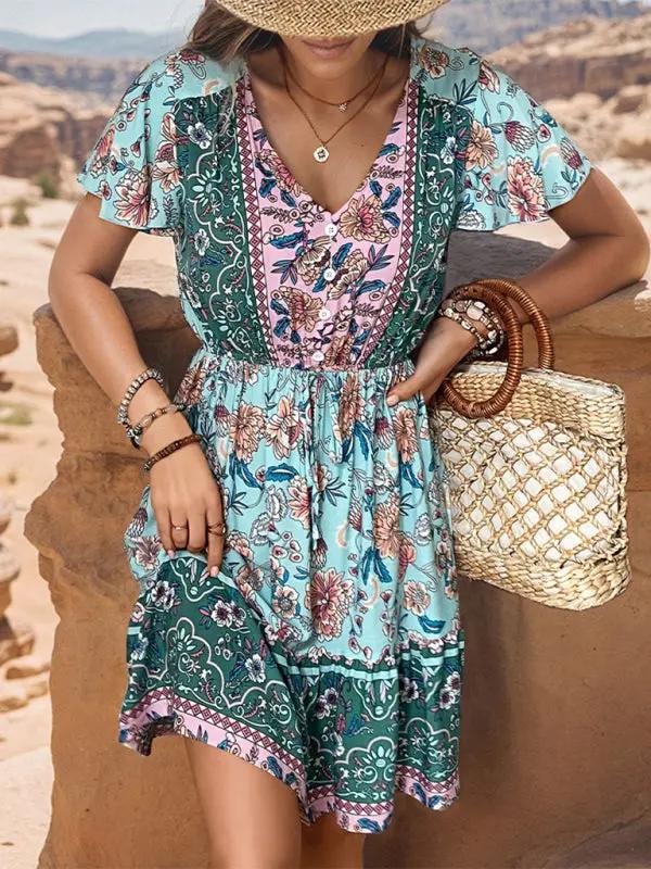Woman in bohemian v-neck dress holding straw bag