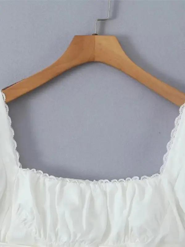 Square neck lace shirt on wooden hanger