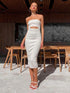 White ribbed tube top dress in outdoor setting