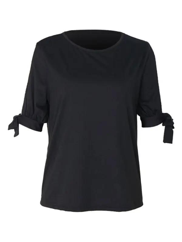 Black blouse with hollow shoulder design and bows