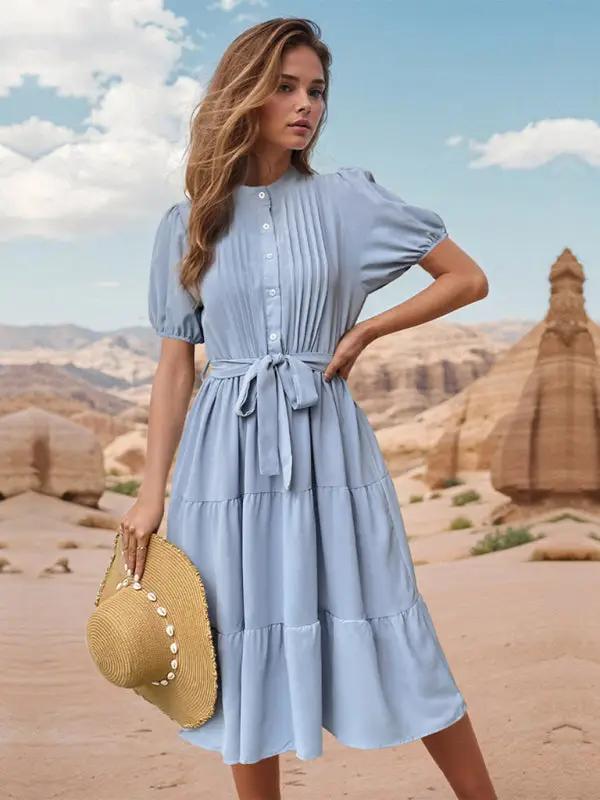Short sleeve blue midi dress with pleats and waist tie