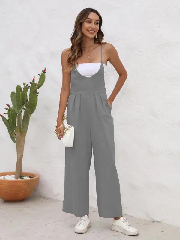 Gray casual suspender trousers, side view