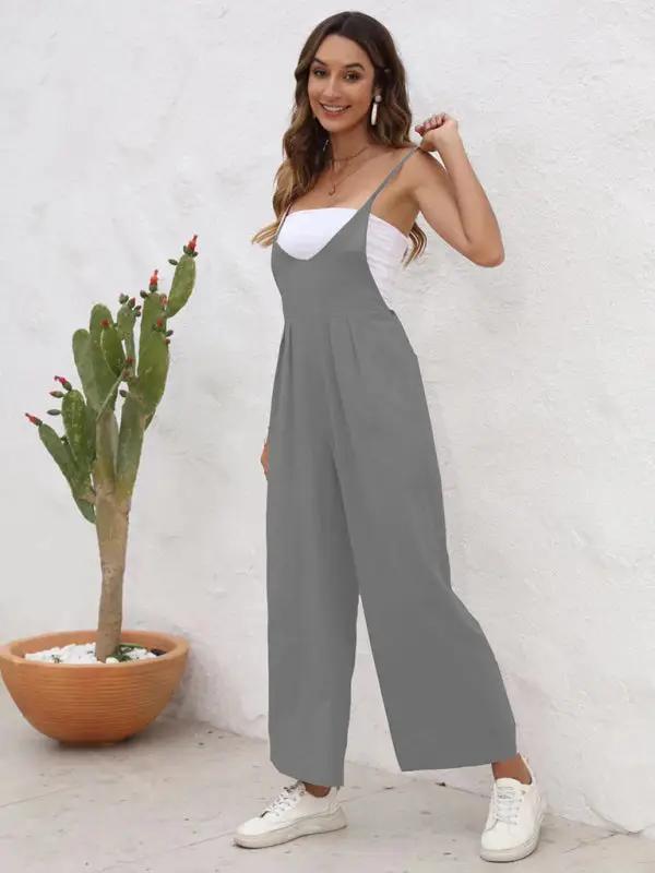 Gray casual suspender trousers, side pose