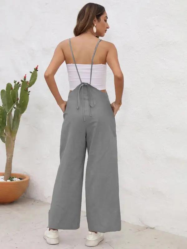 Gray casual suspender trousers, back view