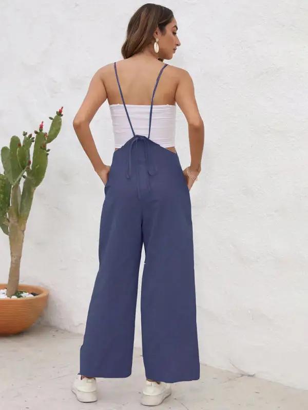 Blue casual suspender trousers, back view