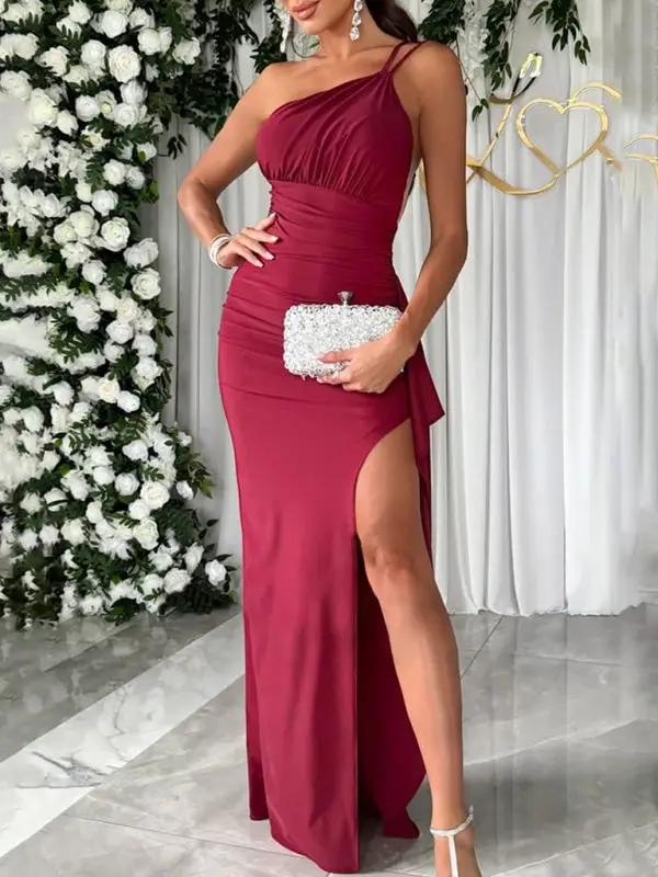 Burgundy shoulder slit party dress close-up