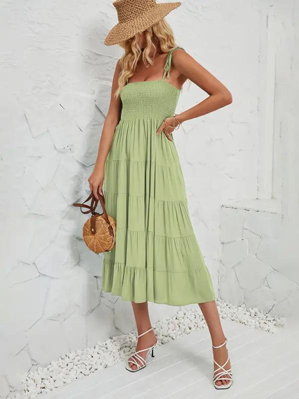 Green sleeveless long suspender dress with hat