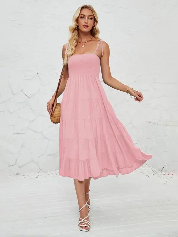 Pink sleeveless long suspender dress front view