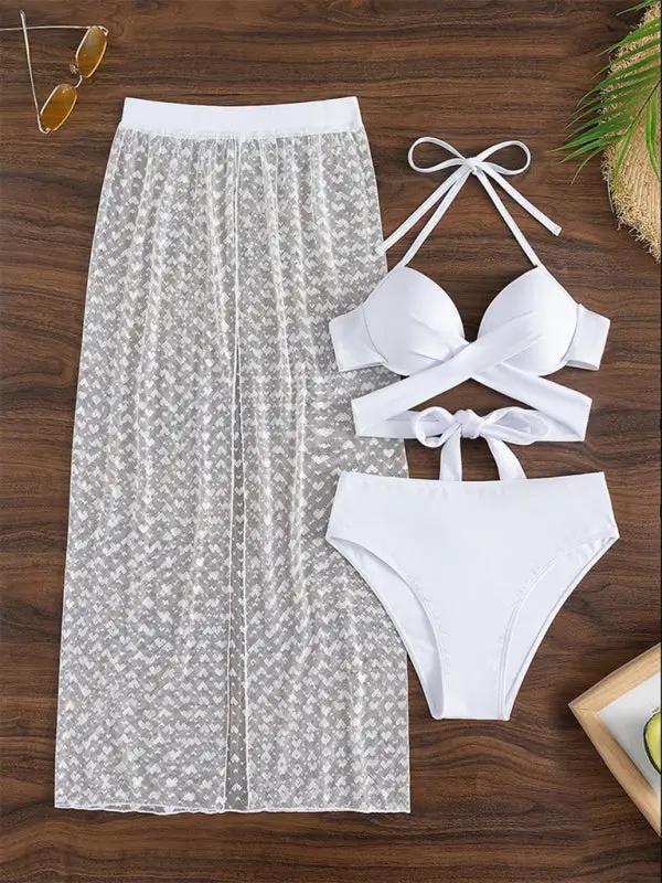 White bikini set with mesh skirt laid flat