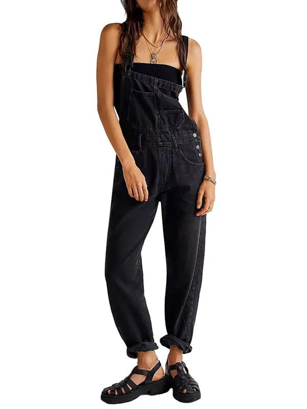 Black denim overalls with rolled cuffs