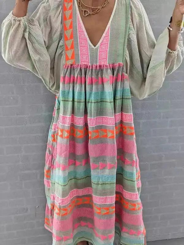Casual dress featuring a deep V-neck and colorful design