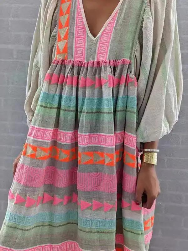 Vibrant pullover dress with geometric patterns and loose fit