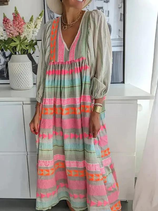 Fashionable colorful dress with deep V-neck and puff sleeves