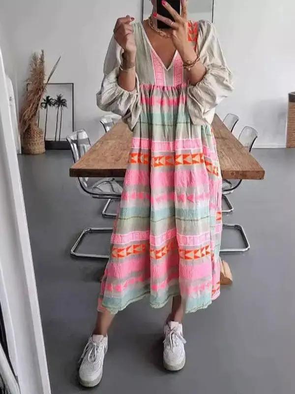 Colorful casual dress with deep V-neck and puff sleeves