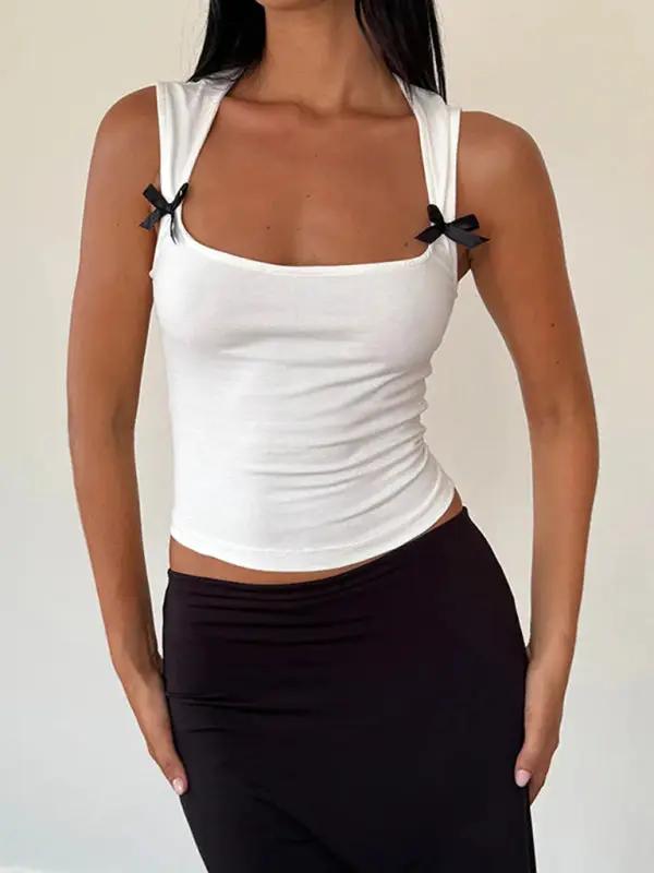 White vest with bow detail, front view