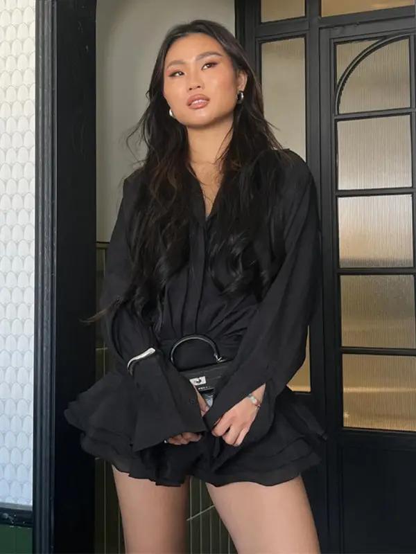 Stylish black V-neck shirt dress with long sleeves