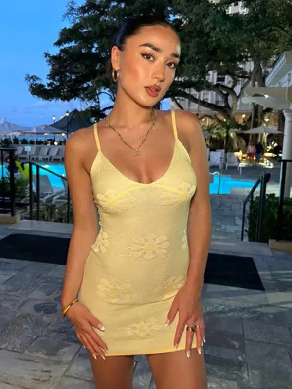 Yellow slim fit suspender dress with floral knit pattern