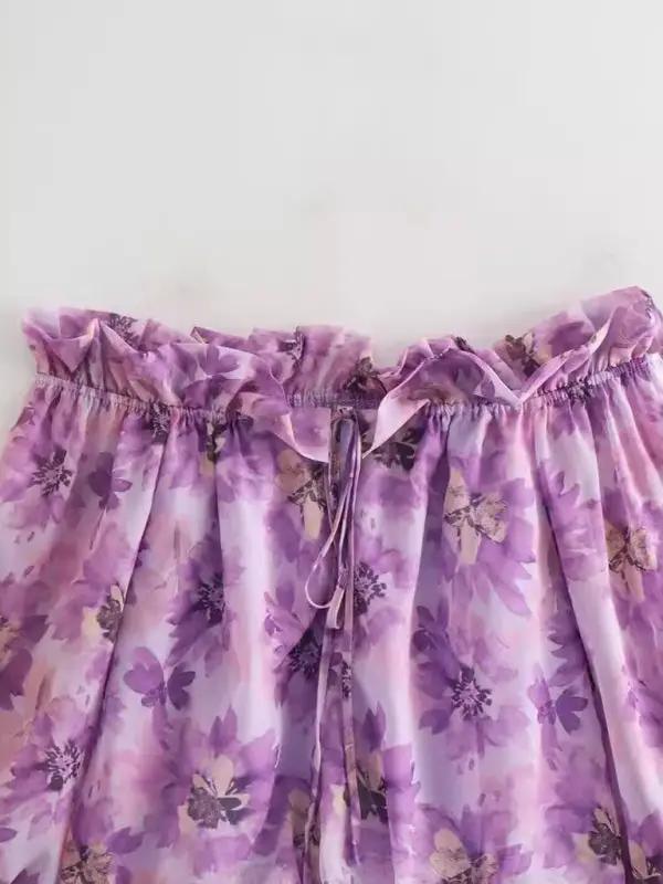 Purple flower shirt top with ruffled neckline detail
