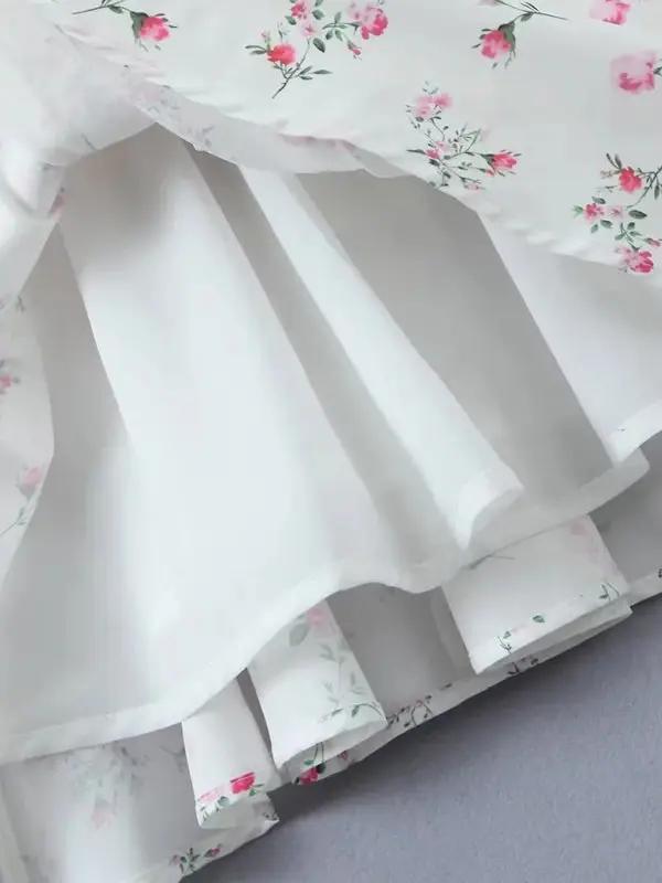 Layered skirt detail of floral suspender dress