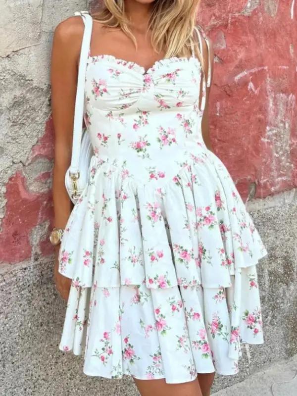 Floral lace-up layered suspender dress worn outdoors