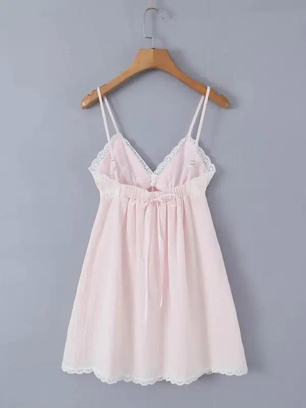 Pink lace V-neck suspender dress on hanger