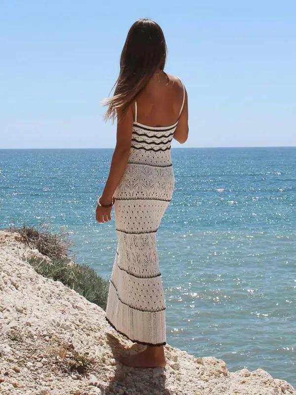 Back view of knitted hollow dress by the sea