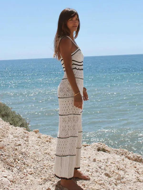 Profile of knitted hollow dress at seaside