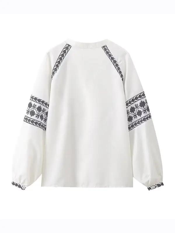 Back view of cross-stitch contrasting shirt