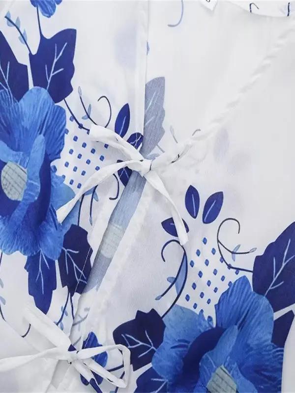 Bow detail on floral print V-neck blouse