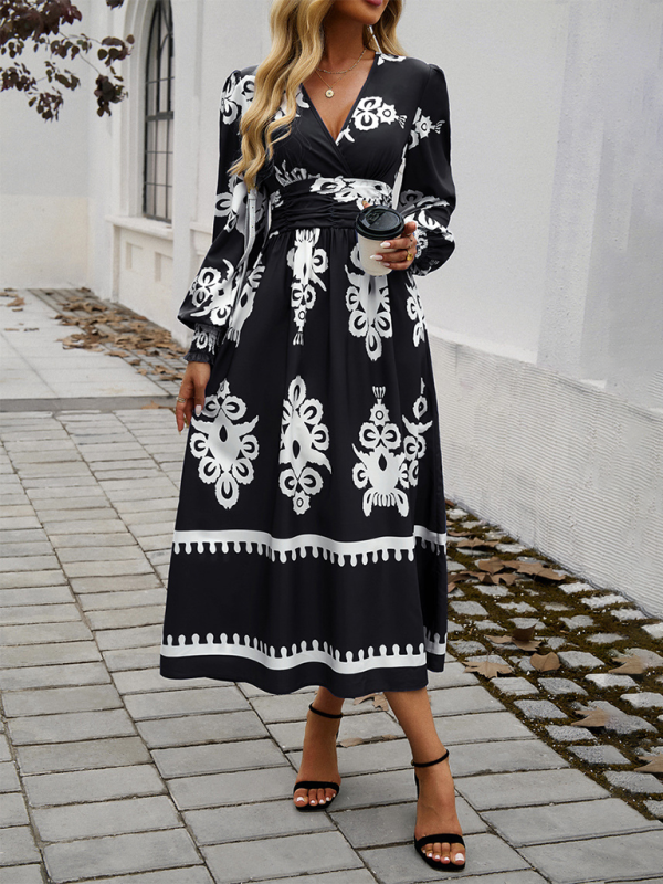 Elegantes Langarmkleid mit V-Ausschnitt und Kontrastfarbdruck