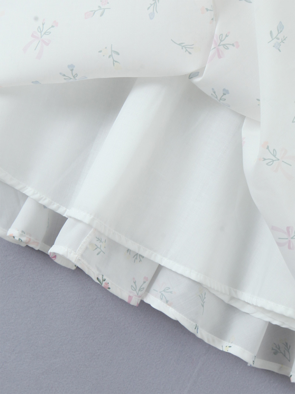 Spitzenkleid mit V-Ausschnitt und Blumenmuster