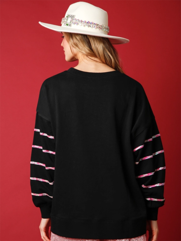 Back view of black striped Santa Claus sweatshirt.