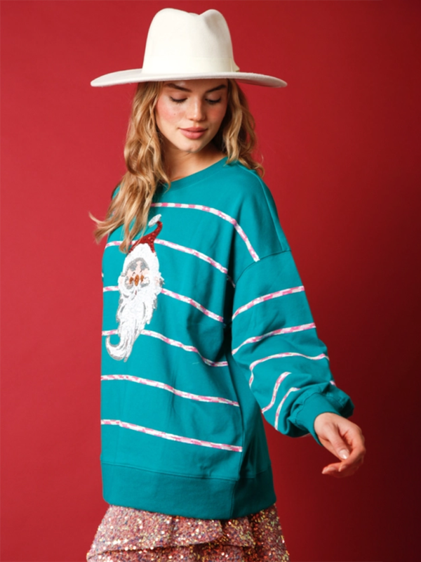 Side view of teal striped Santa Claus sweatshirt.