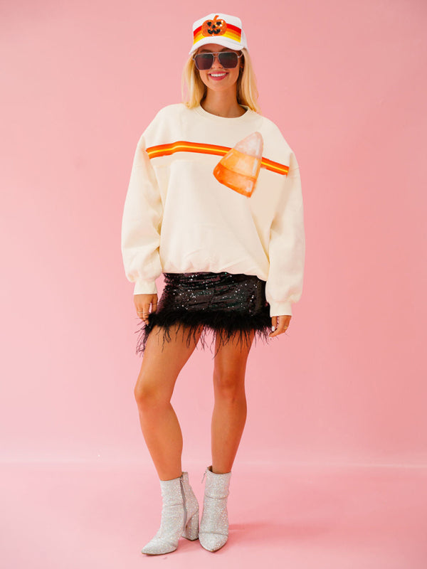 Full view of cream candy corn sweatshirt outfit