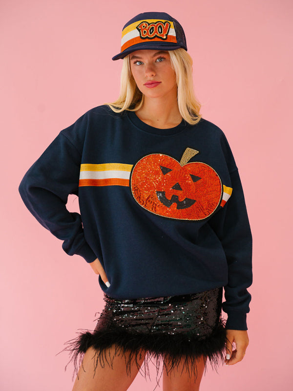 Navy pumpkin sweatshirt with Halloween cap, casual look