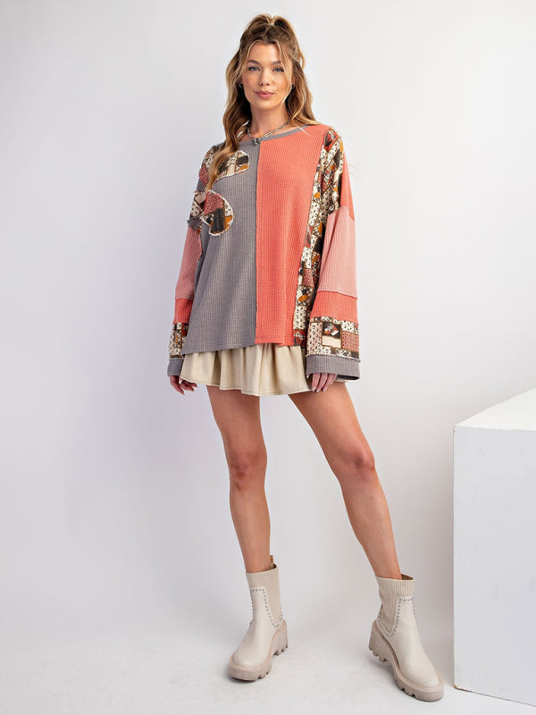 Full outfit with pink and gray waffle top and boots.