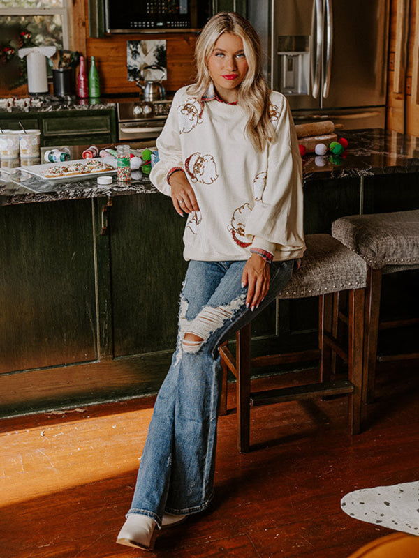 White Santa Claus sequin sweatshirt with ripped jeans