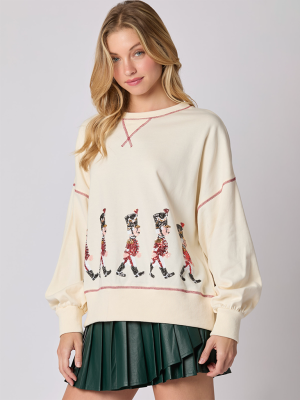 Cream sweatshirt with sequin soldiers, casual style
