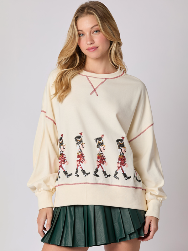 Cream long sleeve sweatshirt with soldier sequin design