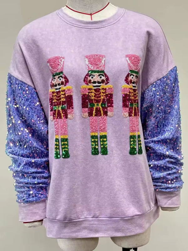 Purple sweater with nutcracker design and sequin sleeves