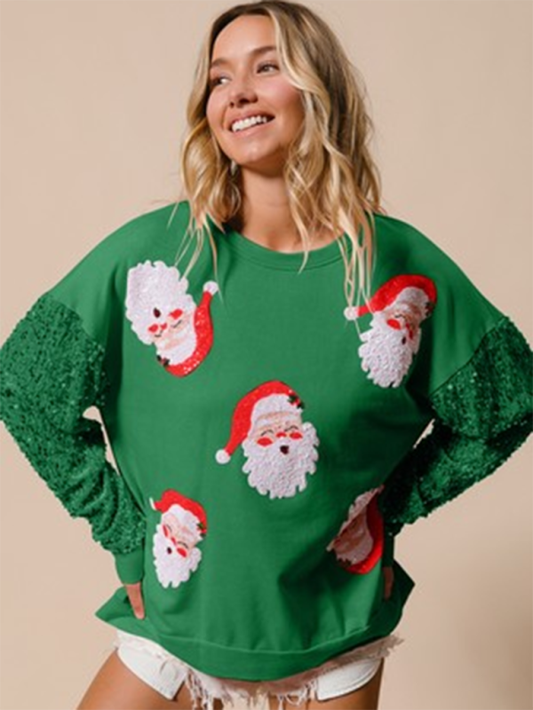 Green sweater with Santa faces and sequin sleeves