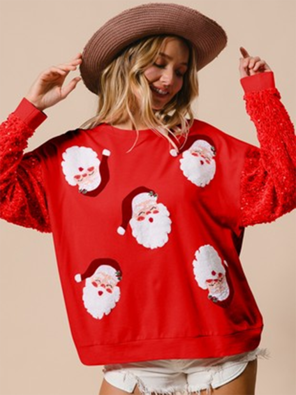 Red sweater with Santa faces and sequin sleeves