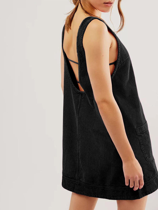 Side view of black corduroy sleeveless vest dress