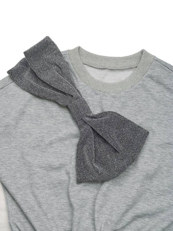 Gray sweater dress with large bow on shoulder
