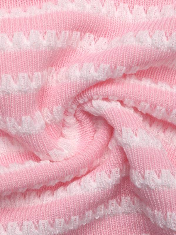 Detailed texture of pink striped tube top fabric