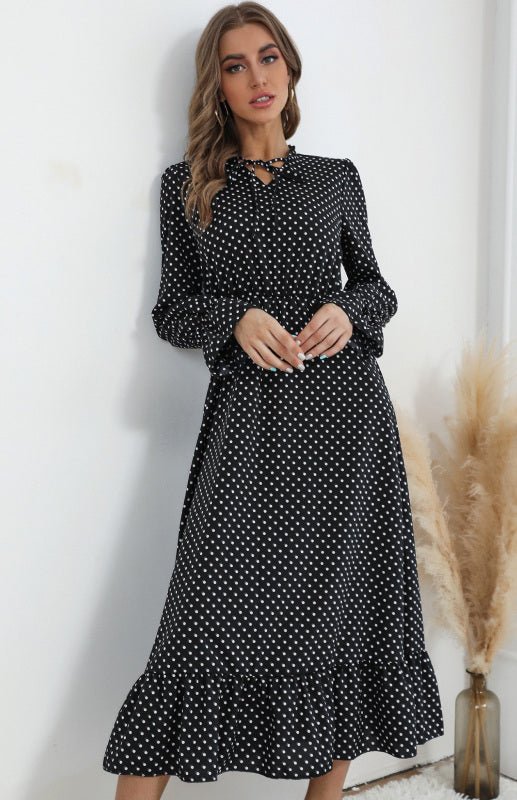 Langärmliges, gepunktetes Damenkleid mit V-Ausschnitt und Bindeband
