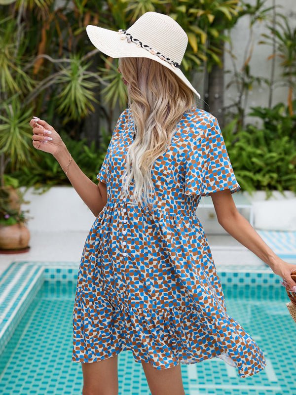 Sommer-loses Urlaubskleid mit V-Ausschnitt, modisches, kurzärmliges, brustförmiges Kleid