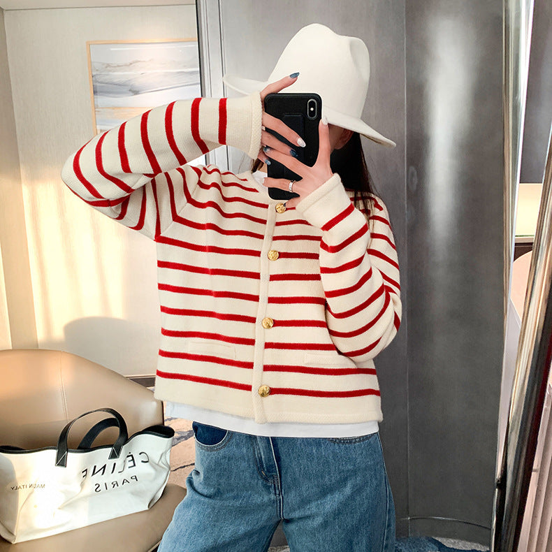 a woman taking a picture of herself in a mirror
