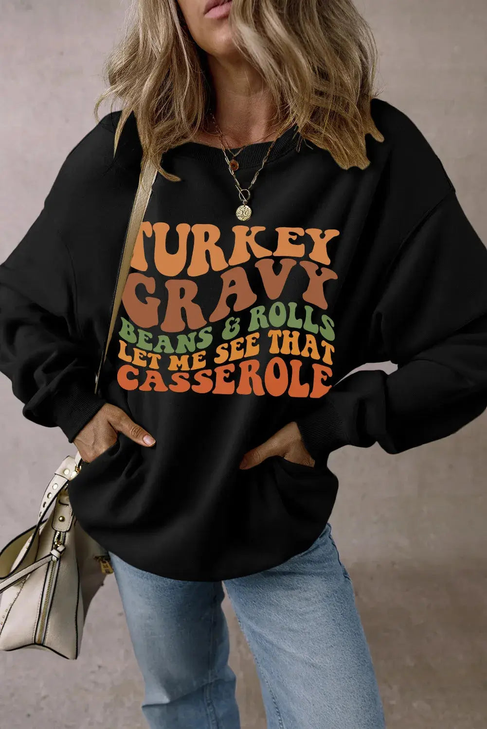 Casual black sweatshirt with festive lettering