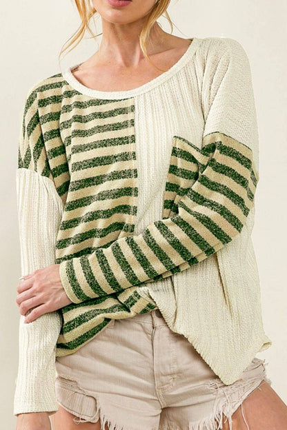 Front view of striped round neck long sleeve top